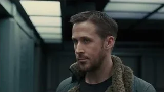 Man with serious expression in industrial setting — Blade Runner 2049