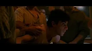 distressed young man in dimly lit room — The Dictator