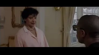 man hanging upside down on door — Creed