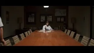 Man deep in thought at conference table — Jobs