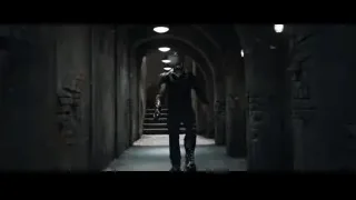 man in black suit in tunnel — Iron Man 3