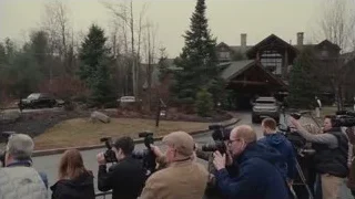 people with cameras around wooden house — Succession