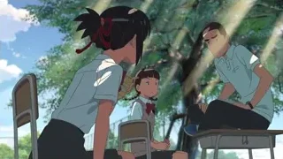 Three people sitting on park bench — Your Name