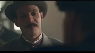 Man in suit and fedora looking at camera — Peaky Blinders