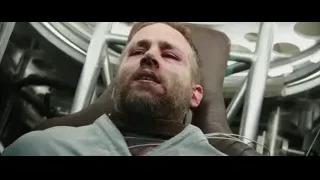 man lying on hospital bed in pain — Deadpool