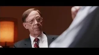 man in suit deep in thought — Jobs