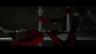 Spider-Man standing on rooftop at night — Spiderman: No Way Home
