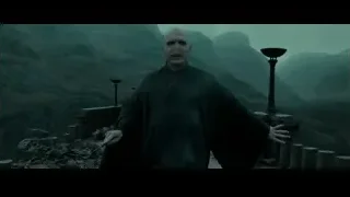 Man in robe on foggy rocky cliff — Harry Potter and the Deathly Hallows 2