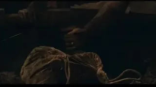 man lying bloody in dark room — Peaky Blinders