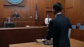 Judge and man speaking in courtroom — Suits
