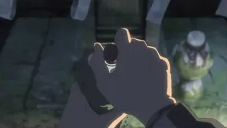 hand holding small object by stone wall — Your Name
