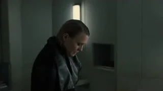 woman in black jacket by window — Blade Runner 2049