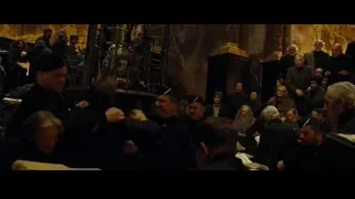 Man and woman arguing around church pulpit — Harry Potter and the Goblet of Fire
