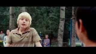 blonde boy holding basketball in park — The Karate Kid