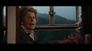 Elderly woman looking out window at mountains — Harry Potter and the Goblet of Fire
