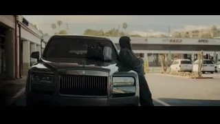 man standing next to black Rolls Royce — Creed 3