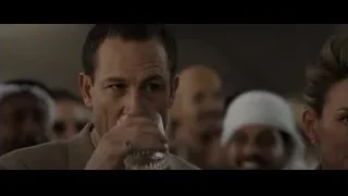 Man's face in crowded room — F1