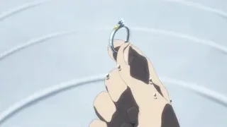 hand holding a silver ring — Weathering with You
