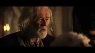 elderly man in robe in dimly lit room — Gladiator