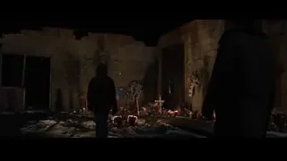 people at a stone wall memorial — Iron Man 3