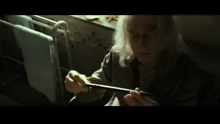 elderly woman holding wand in dimly lit room — Harry Potter and the Deathly Hallows 2