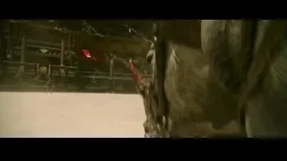 man in battle stance in smoky field — Gladiator 2