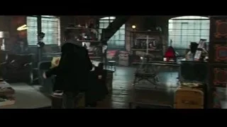 Man in black coat in cluttered kitchen — Now You See Me 2