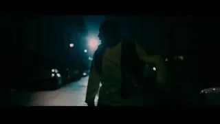 Man in yellow jacket walking at night — Creed 3