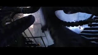 man looking at robot in dark room — The Matrix