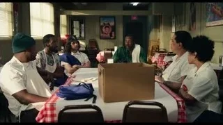 people sitting around restaurant table — The Bear
