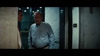 Two men walking down a street — Interstellar