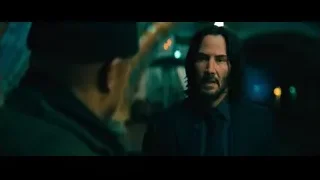 Man with beard and serious expression talking — John Wick: Chapter 4