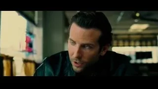 man in leather jacket looking at document — Limitless