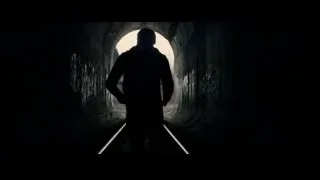 Person walking through dark tunnel — The Amazing Spider Man 2