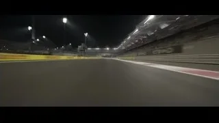 Empty race track at night with stadium — F1