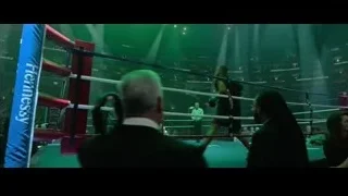 referee standing in boxing ring — Creed 3