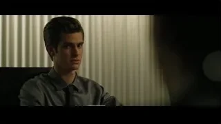 Young man in office chair with serious expression — The Social Network