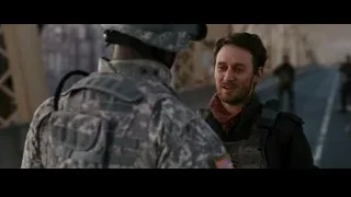 Man in military uniform conversing with soldier — Batman: The Dark Knight Rises