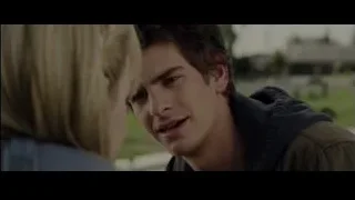 young man and woman talking in a park — The Amazing Spider Man