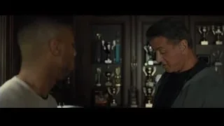 two men conversing in trophy room — Creed 2