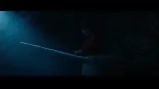 Young boy holding broomstick in dark cave — Harry Potter and the Philosophers Stone