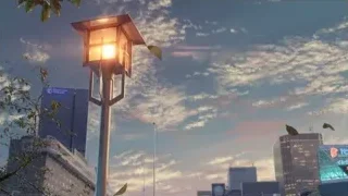 Street lamp post with city skyline — Your Name