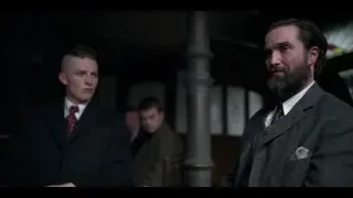 two men in suits by pillar — Peaky Blinders