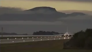 airplane taking off at dusk — Succession
