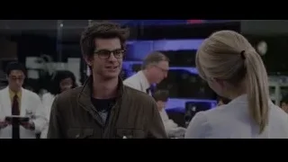 young man and woman talking in laboratory — The Amazing Spider Man