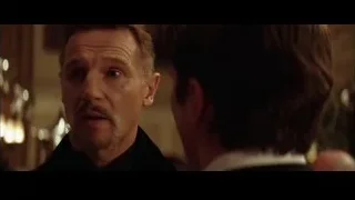 man with serious expression in dim room — Batman