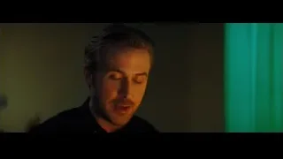 man with hand on chin thinking — La La Land