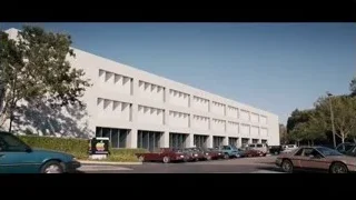 Modern building with parking lot — Jobs