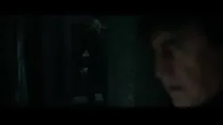 Man in yellow jacket standing in dark tunnel — Spiderman: No Way Home