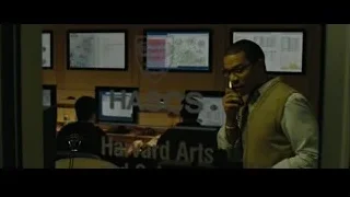 man in office with multiple monitors — The Social Network